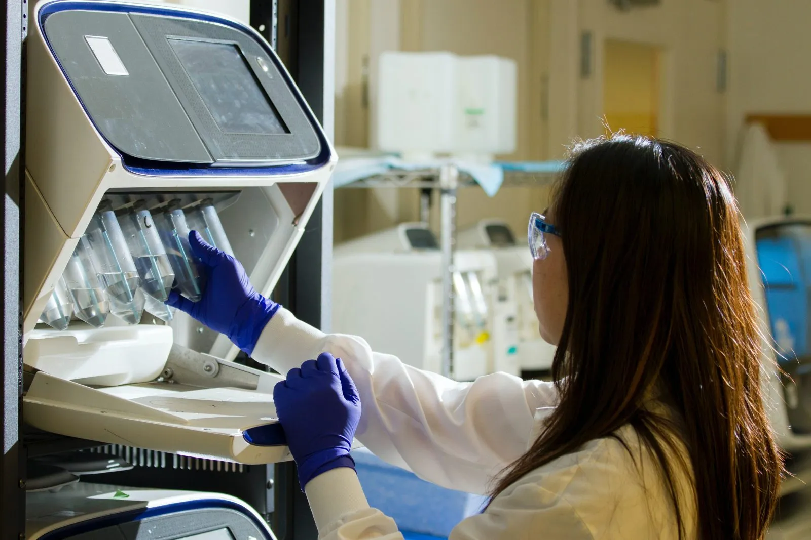 Wide shot of a laboratory bench with test tubes and equipment